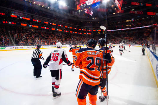 Leon Draisaitl and Jujhar Khaira of the Edmonton Oilers