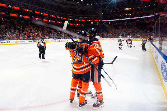 Leon Draisaitl and Jujhar Khaira of the Edmonton Oilers
