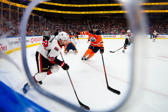 Connor Brown of the Ottawa Senators  and Adam Larsson of