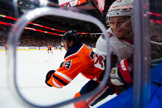 Ethan Bear of the Edmonton Oilers and Mark Borowiecki of