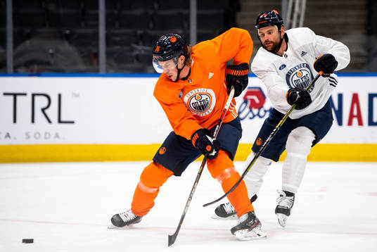 Joel Persson and Zack Kassian of the Edmonton Oilers