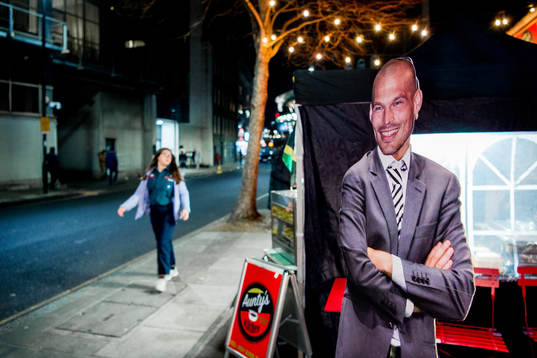 A cardboard of Fredrik Ljungberg, interim manager of Arsenal