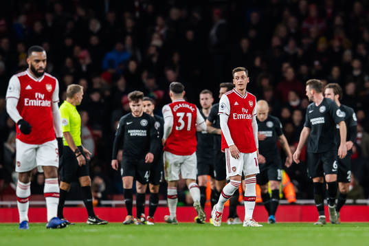 Mesut Özil of Arsenal looks dejected