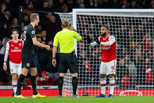 Alexandre Lacazette of Arsenal in a conversation with