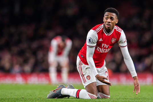 Joe Willock of Arsenal looks dejected