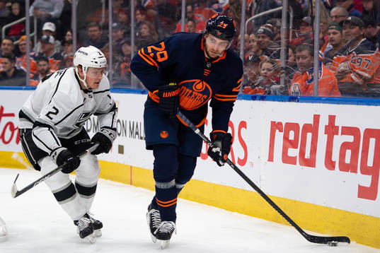 Paul LaDue of the Los Angeles Kings and Leon Draisaitl of