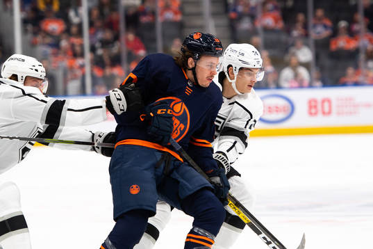 Joakim Nygard of the Edmonton Oilers and Nikolai Prokhorkin