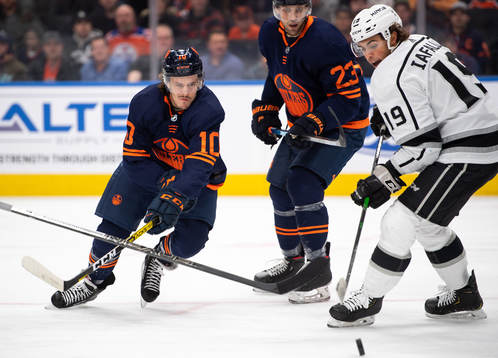 Joakim Nygard of the Edmonton Oilers and Alex Iafallo of