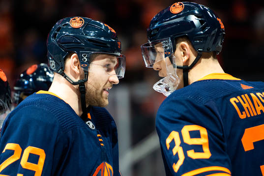 Leon Draisaitl and Alex Chiasson of the Edmonton Oilers