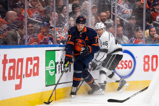Oscar Klefbom of the Edmonton Oilers and Blake Lizotte of
