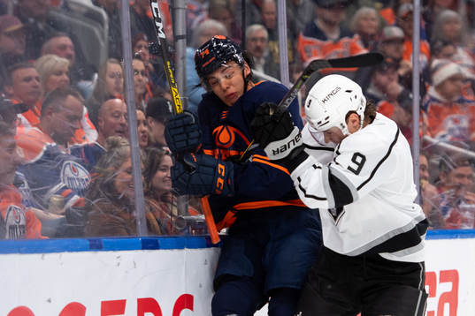 Ethan Bear of the Edmonton Oilers and Adrian Kempe of the