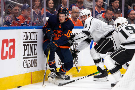 Joakim Nygard of the Edmonton Oilers and Matt Roy of the