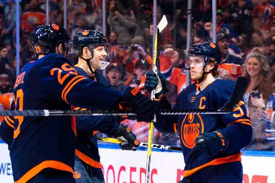 Leon Draisaitl, Alex Chiasson and Connor McDavid of the