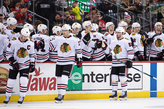 Chicago Blackhawks Jonathan Toews, Dylan Strome and Erik