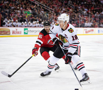 New Jersey Devils Kevin Rooney and Chicago Blackhawks