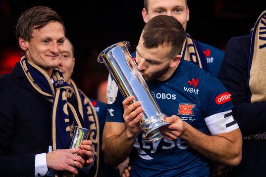 Zlatko Tripic of Viking celebrates with the trophy
