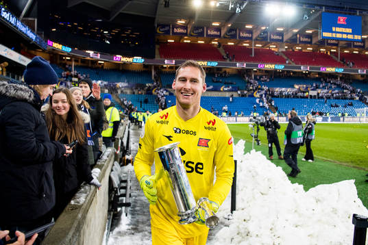 Goalkeeper Iven Austbø of Viking celebrates with the trophy
