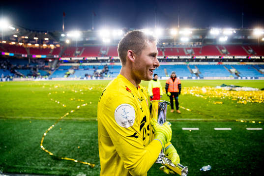 Goalkeeper Iven Austbø of Viking celebrates with the trophy