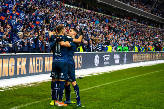 Zlatko Tripic and Ylldren Ibrahimaj of Viking celebrates