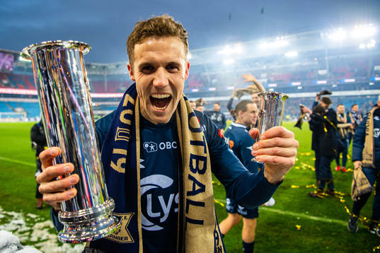 Fredrik Torsteinbø of Viking celebrates with the trophy