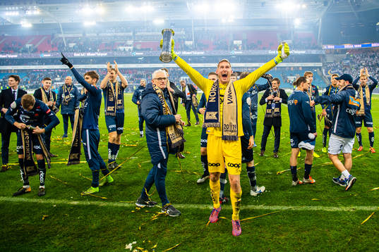 Goalkeeper Iven Austbø of Viking celebrates with the trophy
