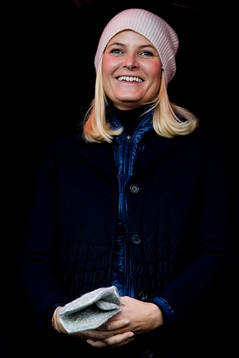 Mette-Marit, crown princess of Norway, in the stands ahead