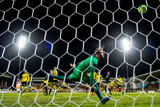 Martin Ramsland of Start scores 4-1 behind goalkeeper Marko
