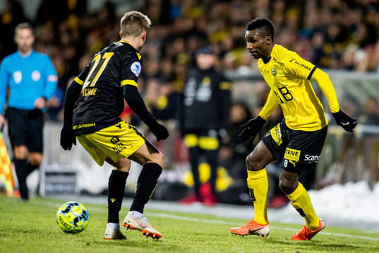 Eirik Wichne of Start and Ifeanyi Mathew of Lillestrøm