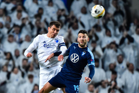 Andreas Bjelland of FC Köpenhamn and Erdal Rakip of Malmö