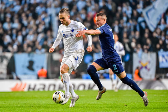 Pierre Bengtsson of FC Köpenhamn and Eric Larsson of