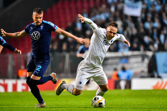 Pierre Bengtsson of FC Köpenhamn and Eric Larsson of