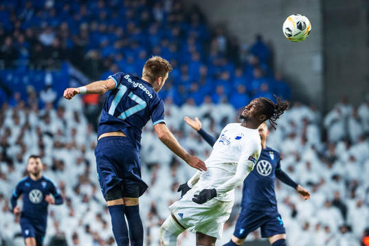 Rasmus Bengtsson of Malmö FF and Dame N'Doye of FC