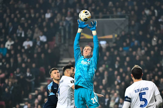 Arnor Traustason of Malmö FF and goalkeeper Karl-Johan