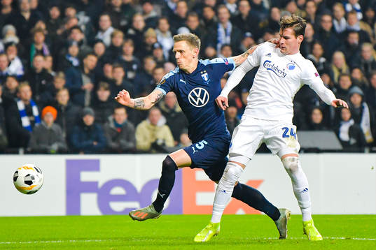 Sören Rieks of Malmö FF against and Robert Mudrazija of