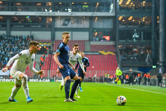 Robert Mudrazija of FC Köpenhamn and Sören Rieks of