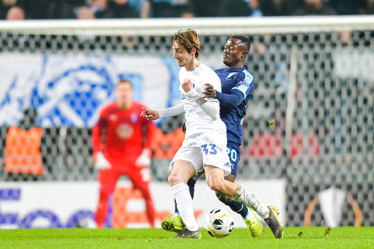 Rasmus Falk of FC Köpenhamn and Bonke Innocent of Malmö FF
