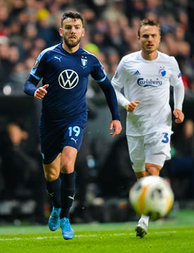 Erdal Rakip of Malmö FF and Pierre Bengtsson of FC