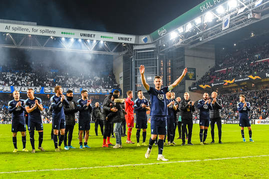 Playaers of Malmö FF celebrate with Markus Rosenberg