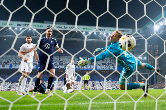 Markus Rosenberg of Malmö FF look at the ball shot by