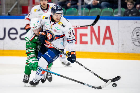 Rögles Erik Andersson och Växjös Brendan Shinnimin