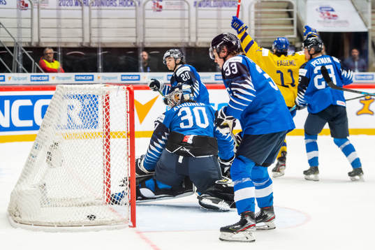 Goalkeeper Justus Annunen of Finland looks dejected