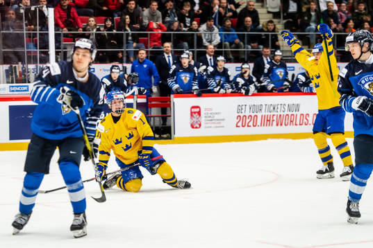 Alexander Holtz of Sweden celebrates