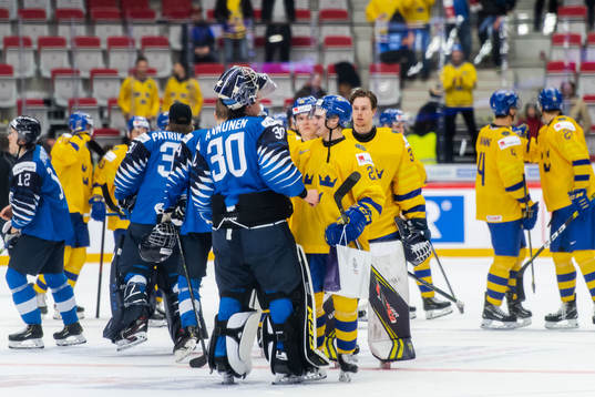 Nils Höglander of Sweden and goalkeeper Justus Annunen of