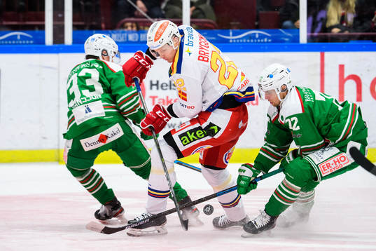 Malmö Redhawks Lars Bryggman mot Rögles Niklas Hansson