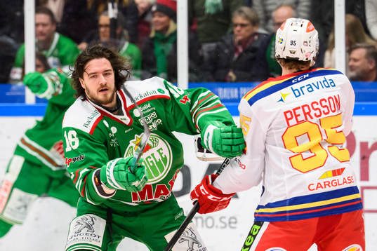 Rögles Dennis Everberg och Malmö Redhawks Carl Persson