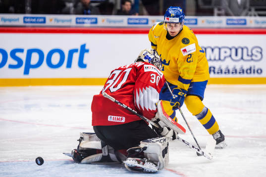 Nils Höglander of Sweden score 0-3 behind goalkeeper Luca