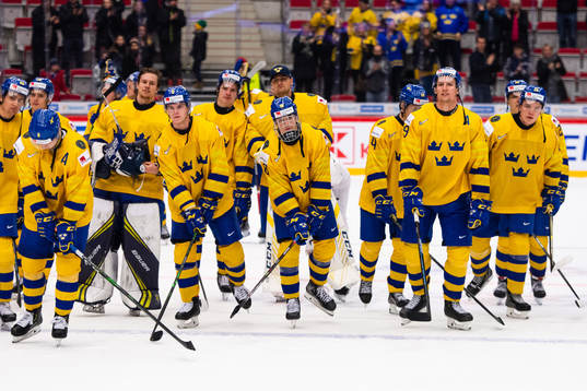 Players of Sweden celebrate