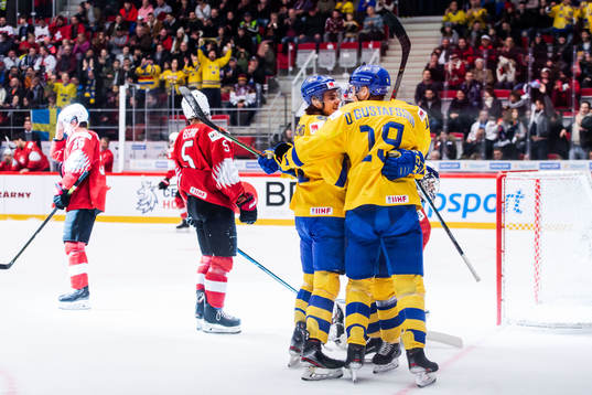 Samuel Fagemo of Sweden celebrate with teammates
