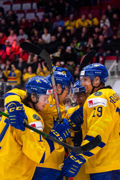 Players of Sweden celebrate the 0-2 goal by Samuel Fagemo