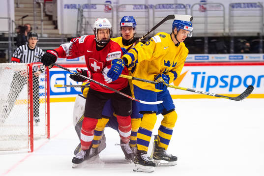 Simon Knak of Switzerland against Tobias Björnfot and